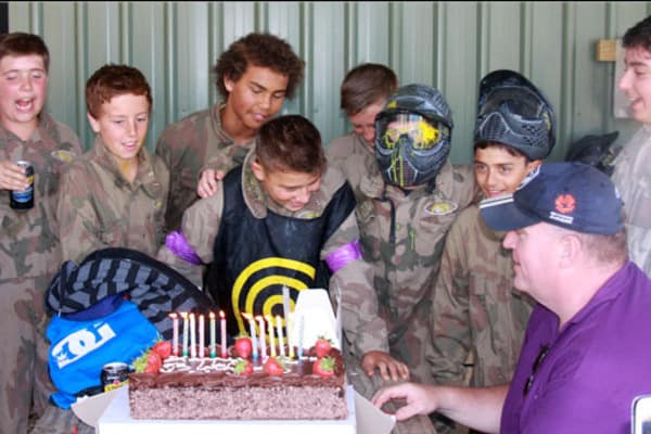Birthday party group in paintball kit at Delta Force Paintball