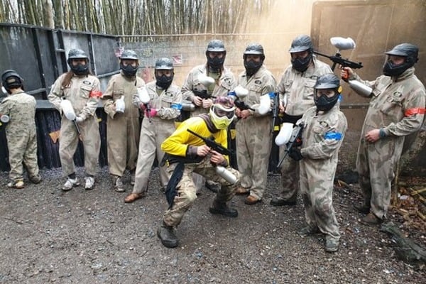 Friends celebrating a birthday paintball day out