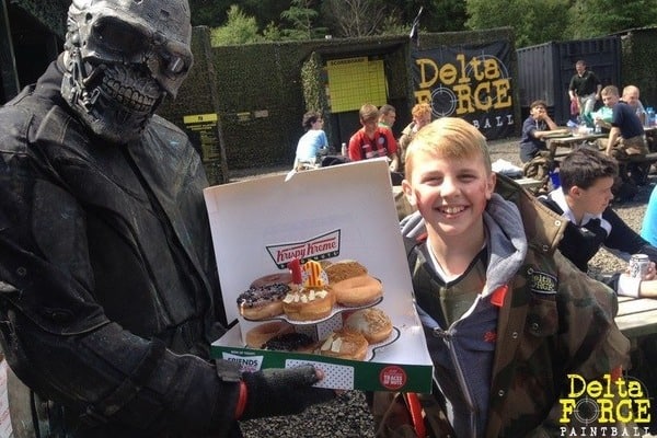 Delta Force marshal holding a birthday cake box