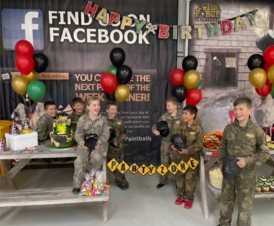 Kids paintball birthday party zone with balloons