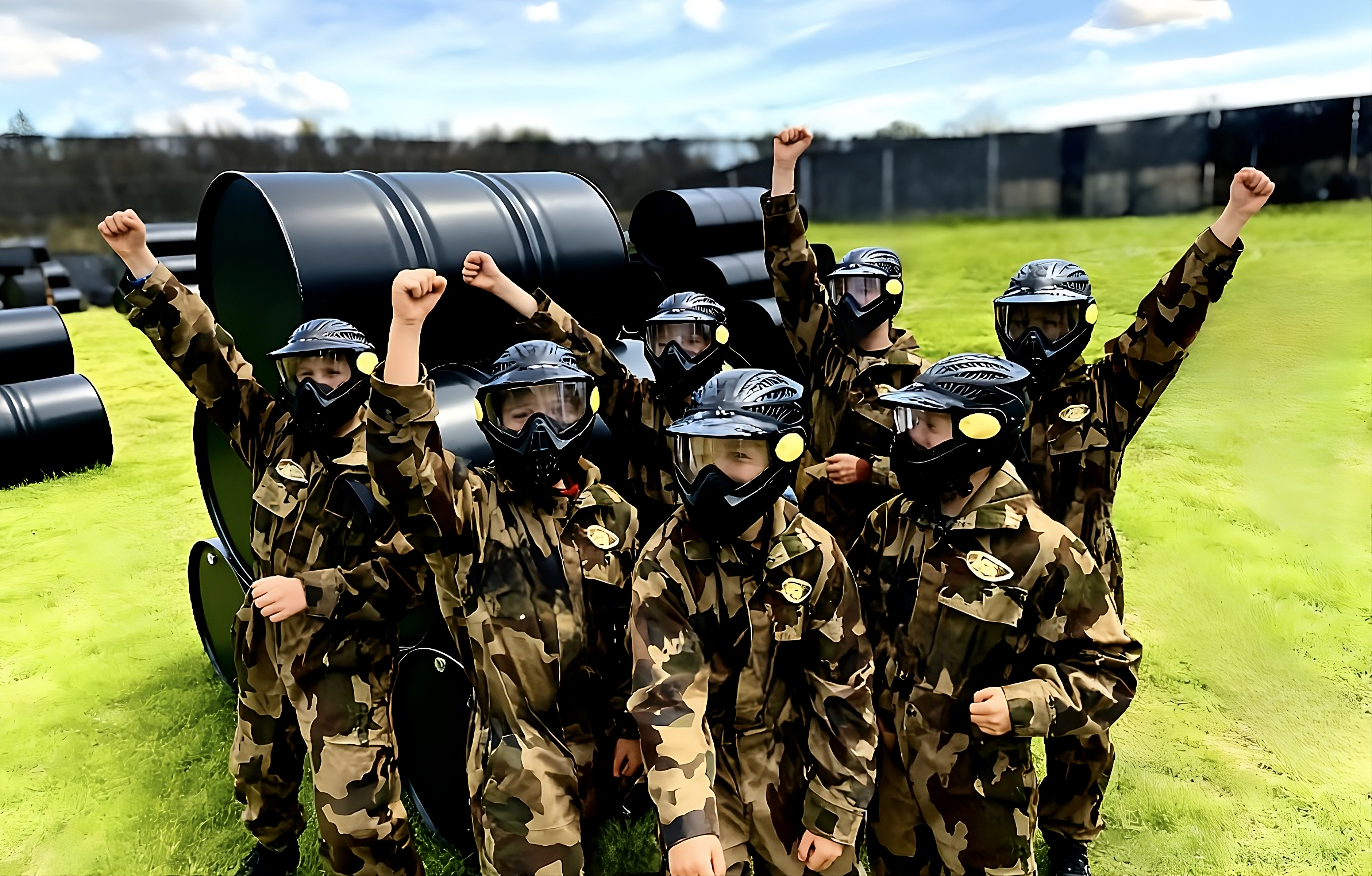 Miniball group cheering in camouflage kit