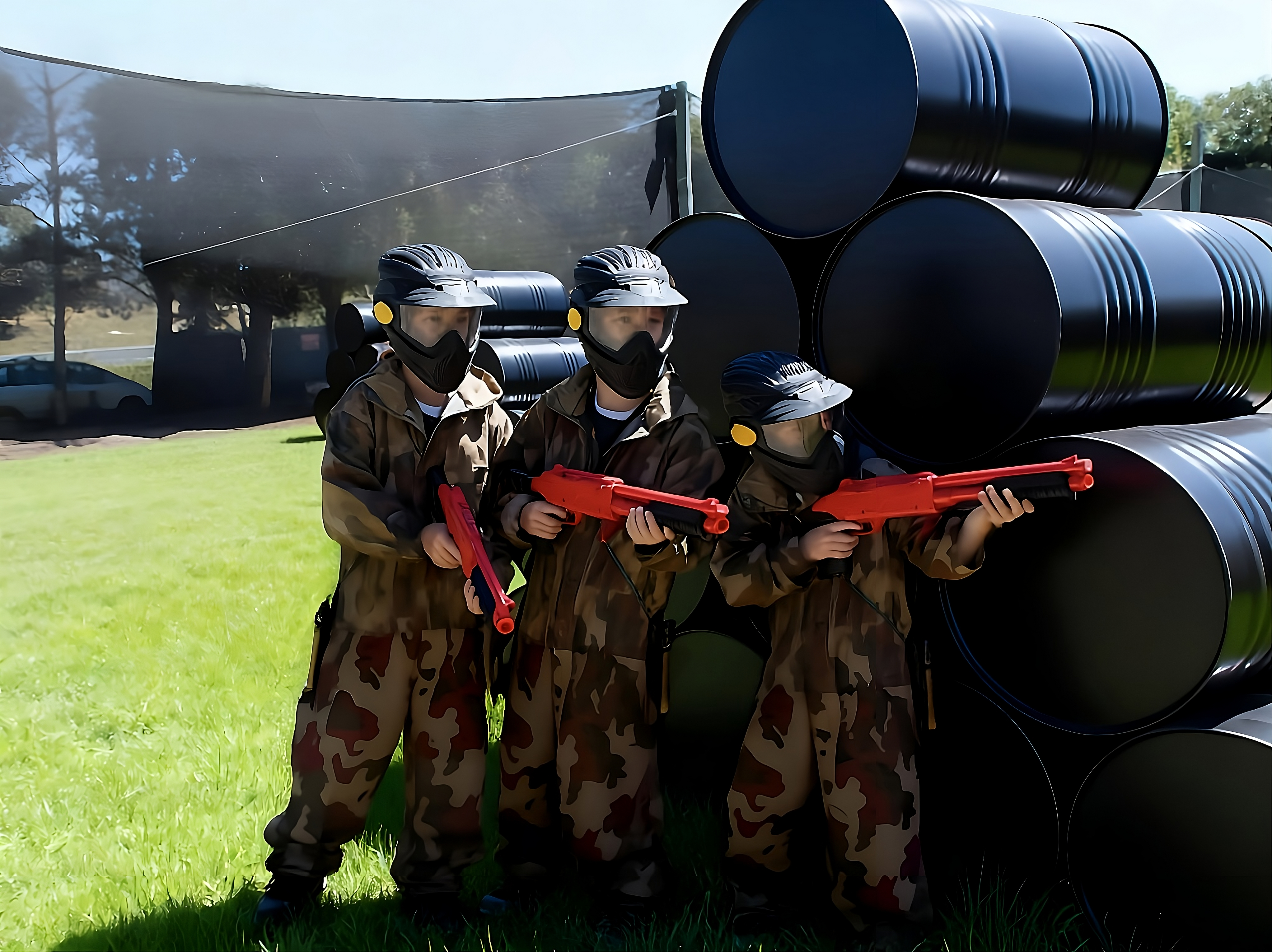 Three Miniball players with red markers near barrel cover