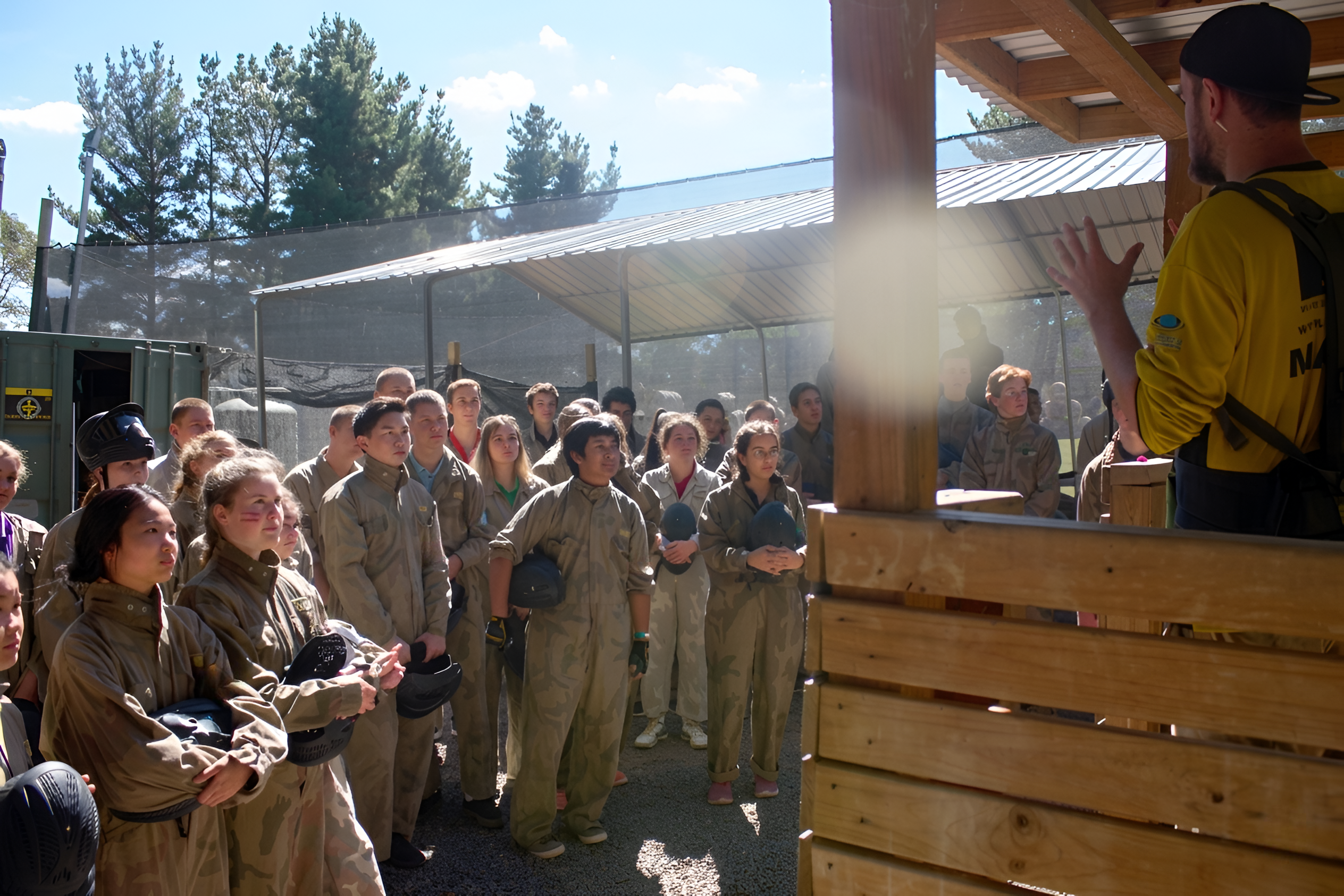Scouts listening to a Delta Force marshal briefing