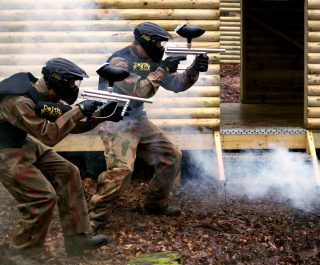 Paintball Players Play Vietcong Village With Smoke