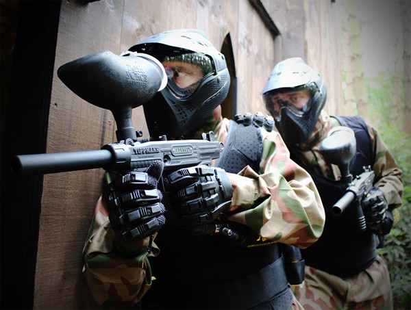 Two Paintball Players Peer Round the Entrance to the Crypt