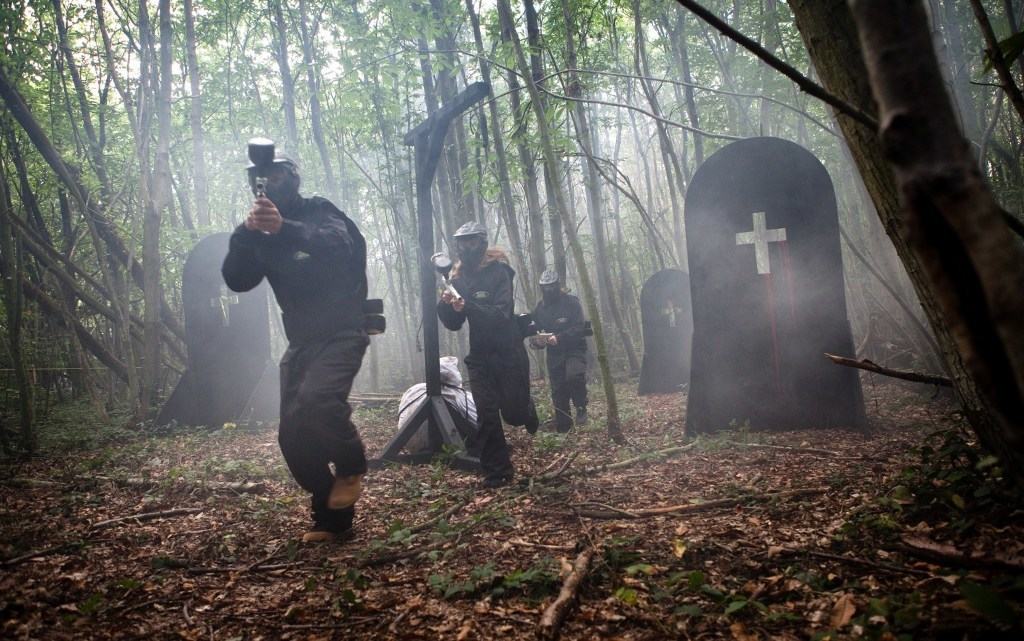 Three players advance through smoking graveyard