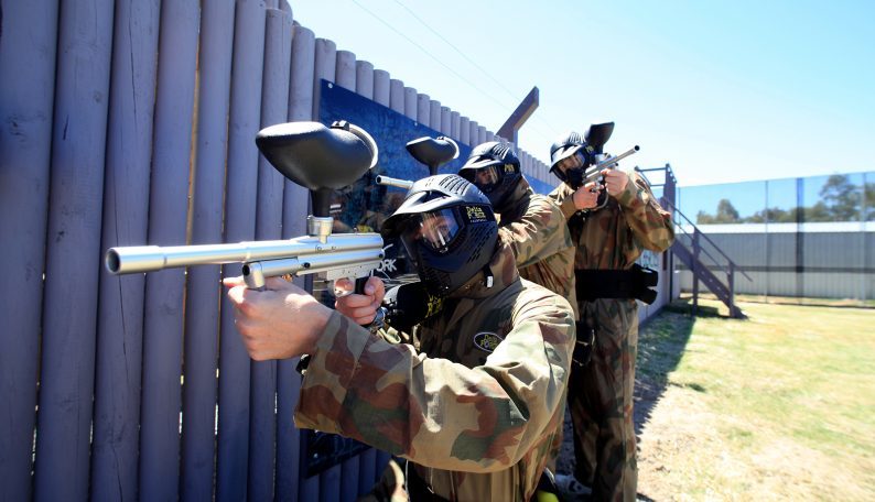 Delta Force Players Lined Up Against Berlin Wall