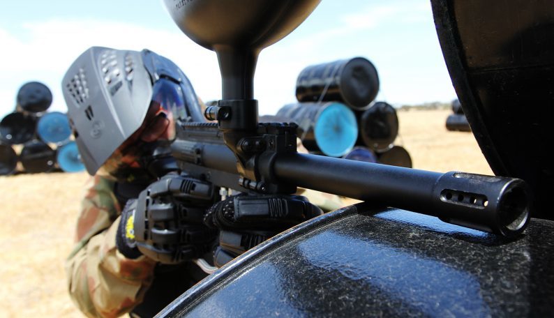 Delta Force Player Looking Down The Side Of Paintball Gun