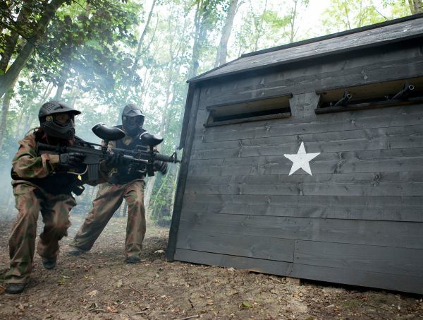 Two players advance around WWII bunker