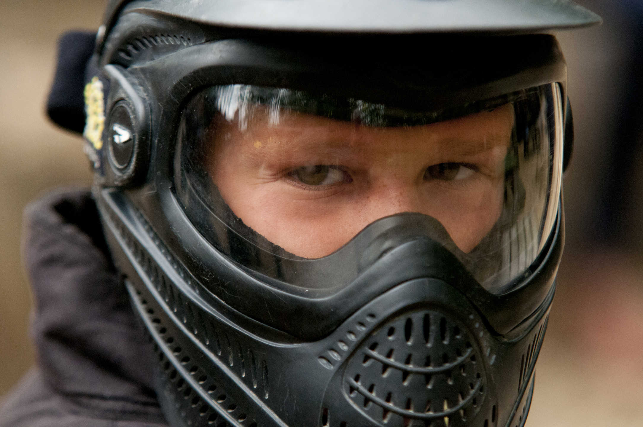 Boy Wearing Delta Force Paintball Helmet