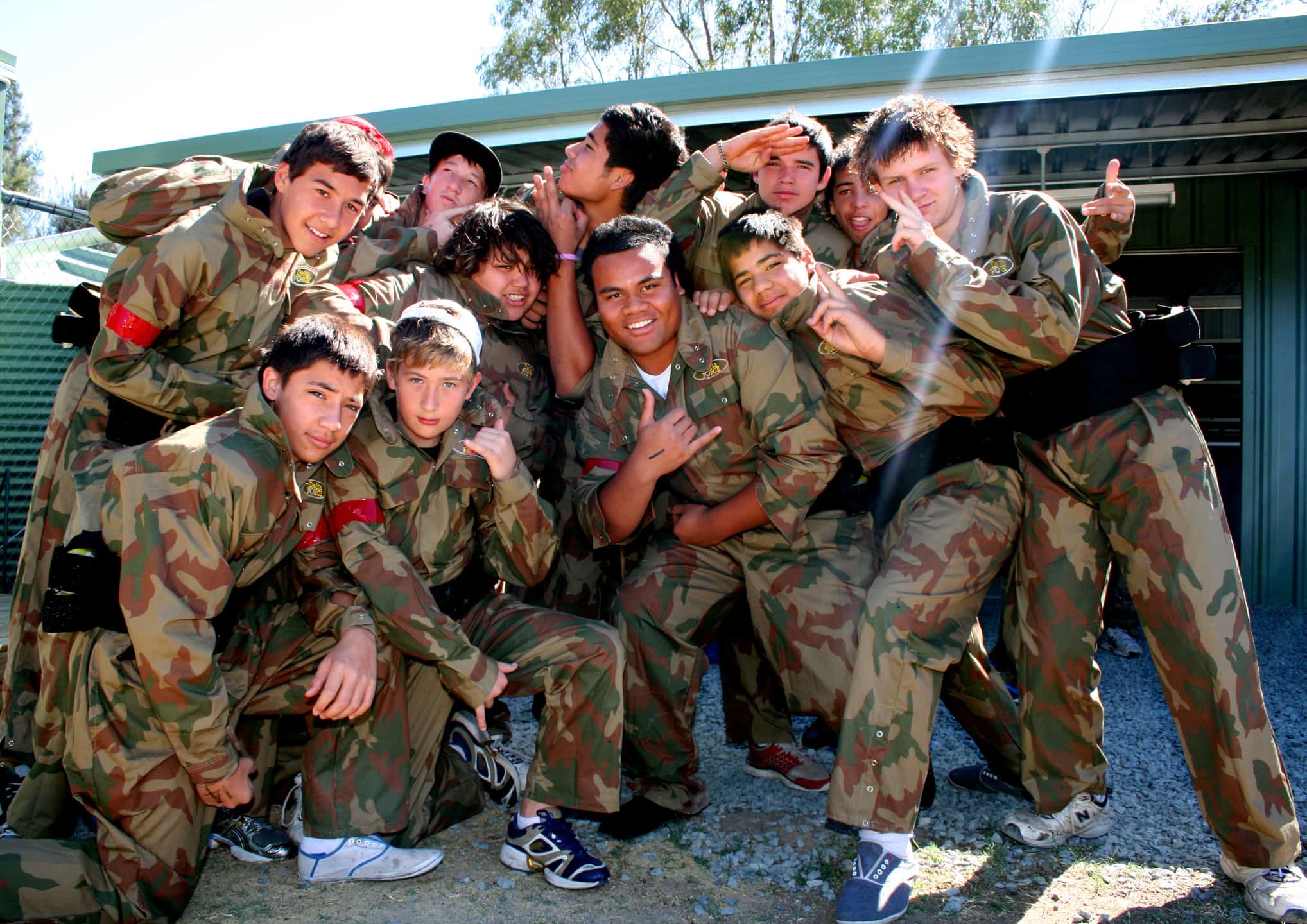 Boys Posing In Delta Force Paintball Camouflage Uniform