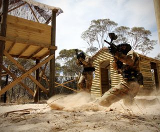 Delta Force Player Slides In Sand At Vietcong Village