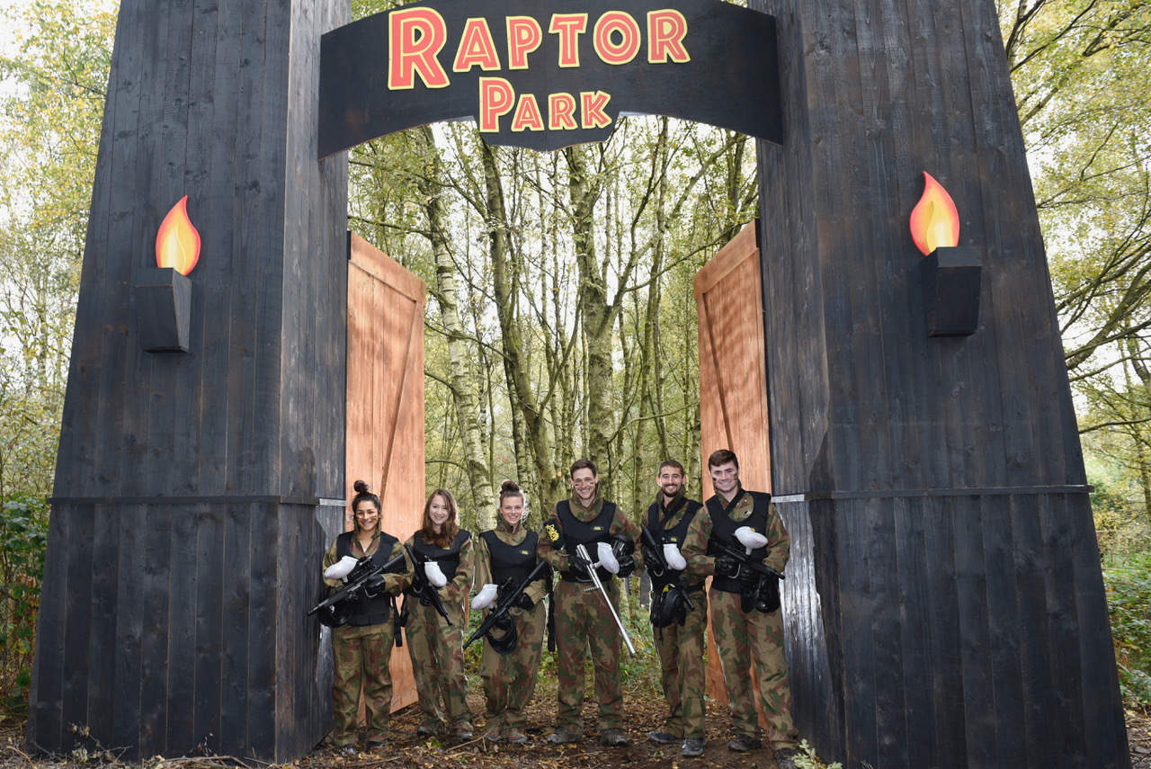 Paintball Players Under Entrance to Raptor Park