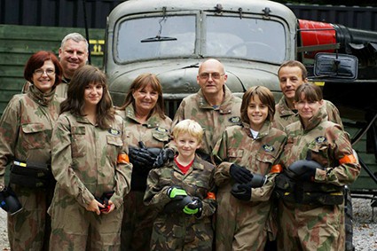 Family at Paintball Centre Pose in front of Truck