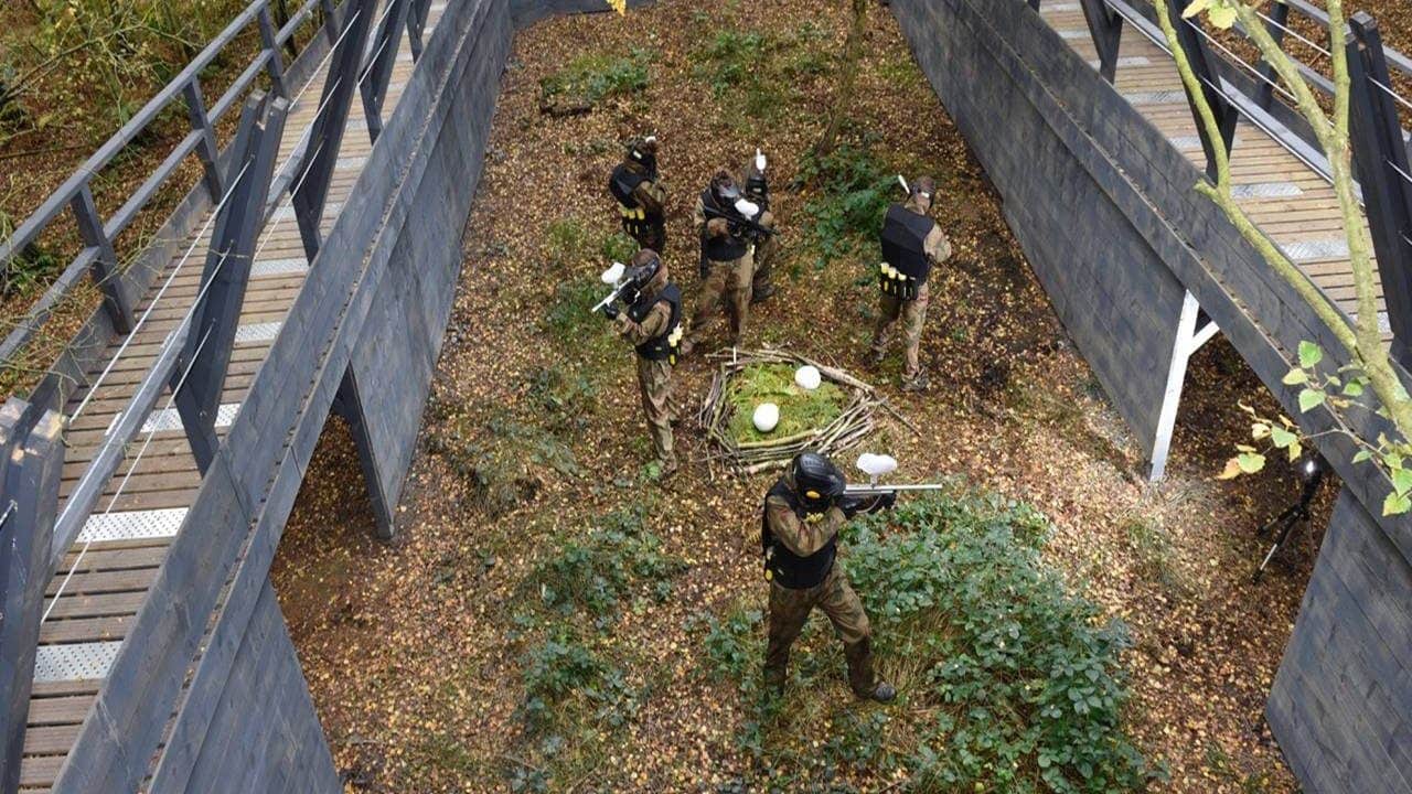 Delta Force Paintball Players In Raptor Enclosure