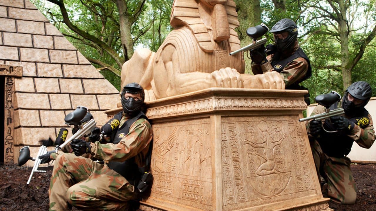 Paintball Players Hide Behind Pharaoh Tomb Raider