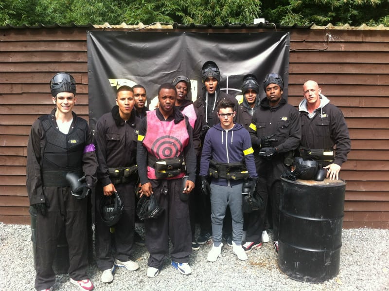 Dance Group Diversity Pose At Delta Force Paintball