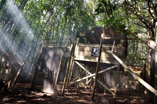 Fortified guard tower surrounded by fencing