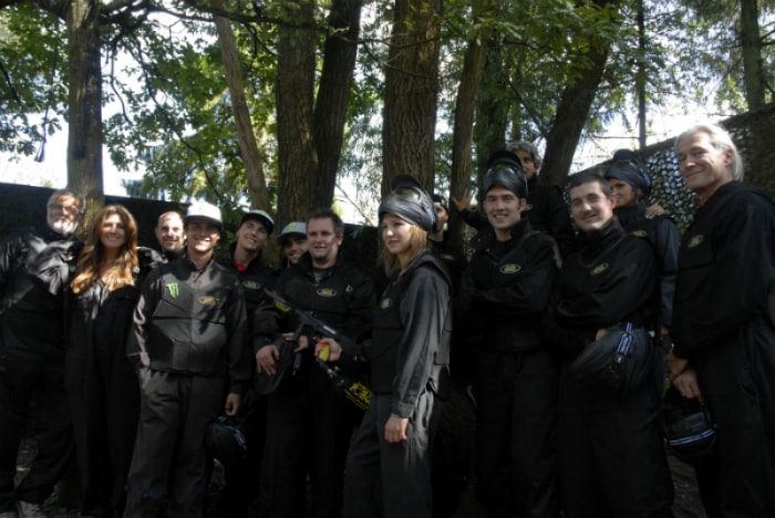 Moto Cross riders smile at Delta Force base camp