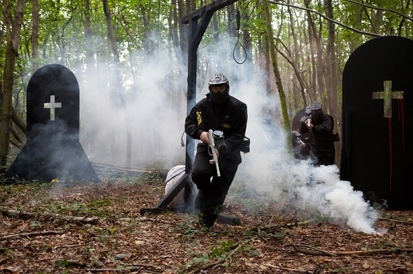 Graveyard player runs through smoke