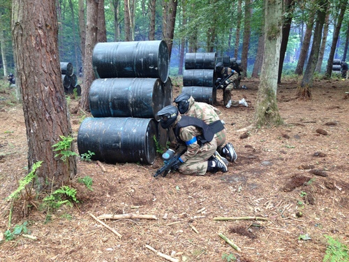 Newcastle players taking cover behind barrels