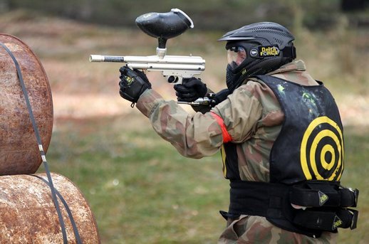 Player takes a shot behind Speedball barrels