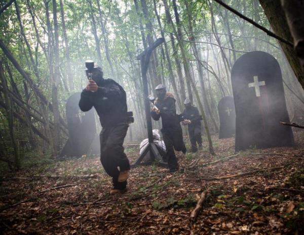 Three players sprint through graveyard