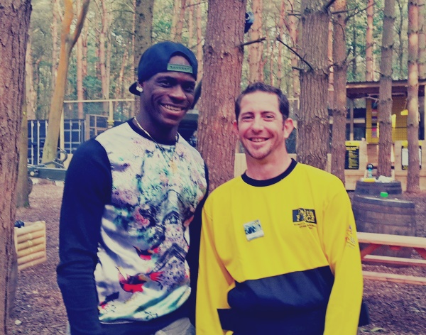 Mario Balotelli smiles with marshal