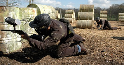 Players fire lying behind Speedball barrels