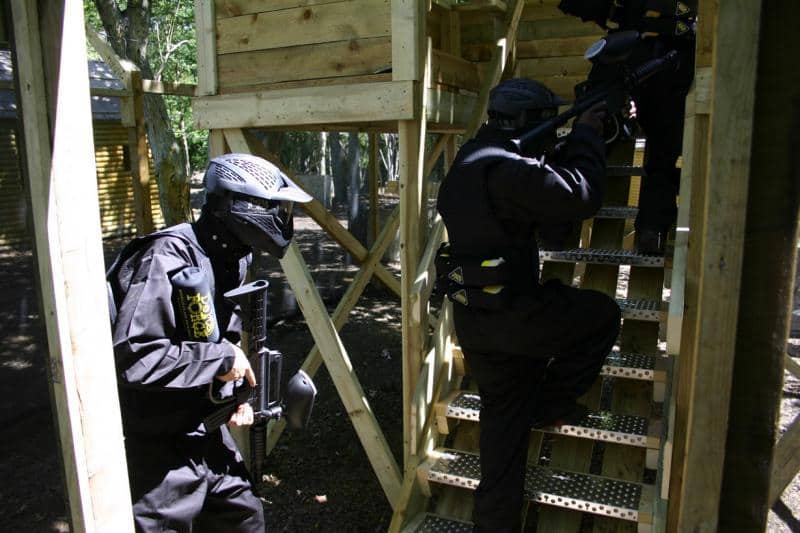 Players climb tower steps