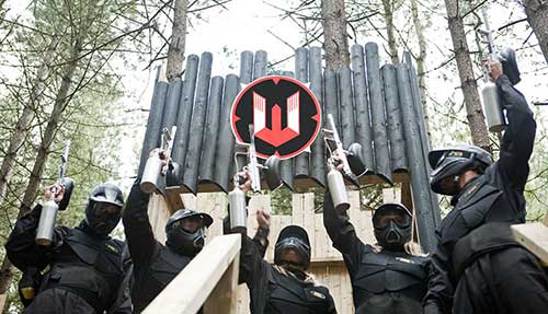 Players Raise Paintball Guns at Castle Wallenberg