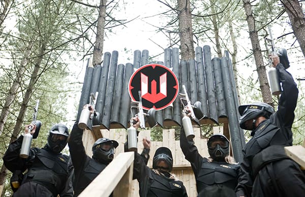 players raise paintball guns castle wallenberg